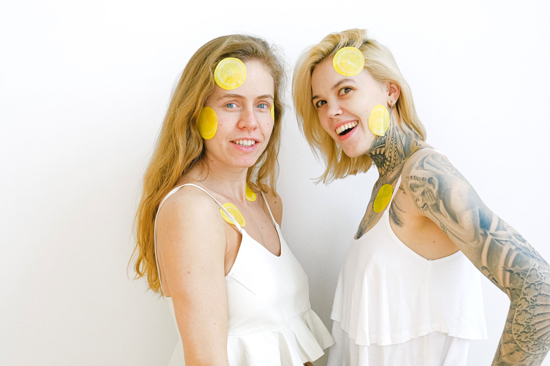 Two fresh lemons on white background, symbolizing the Hello Nancy Lemon vibrator